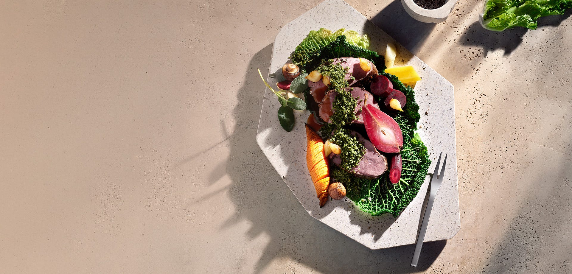 Plated dish on a stone table, ready to serve